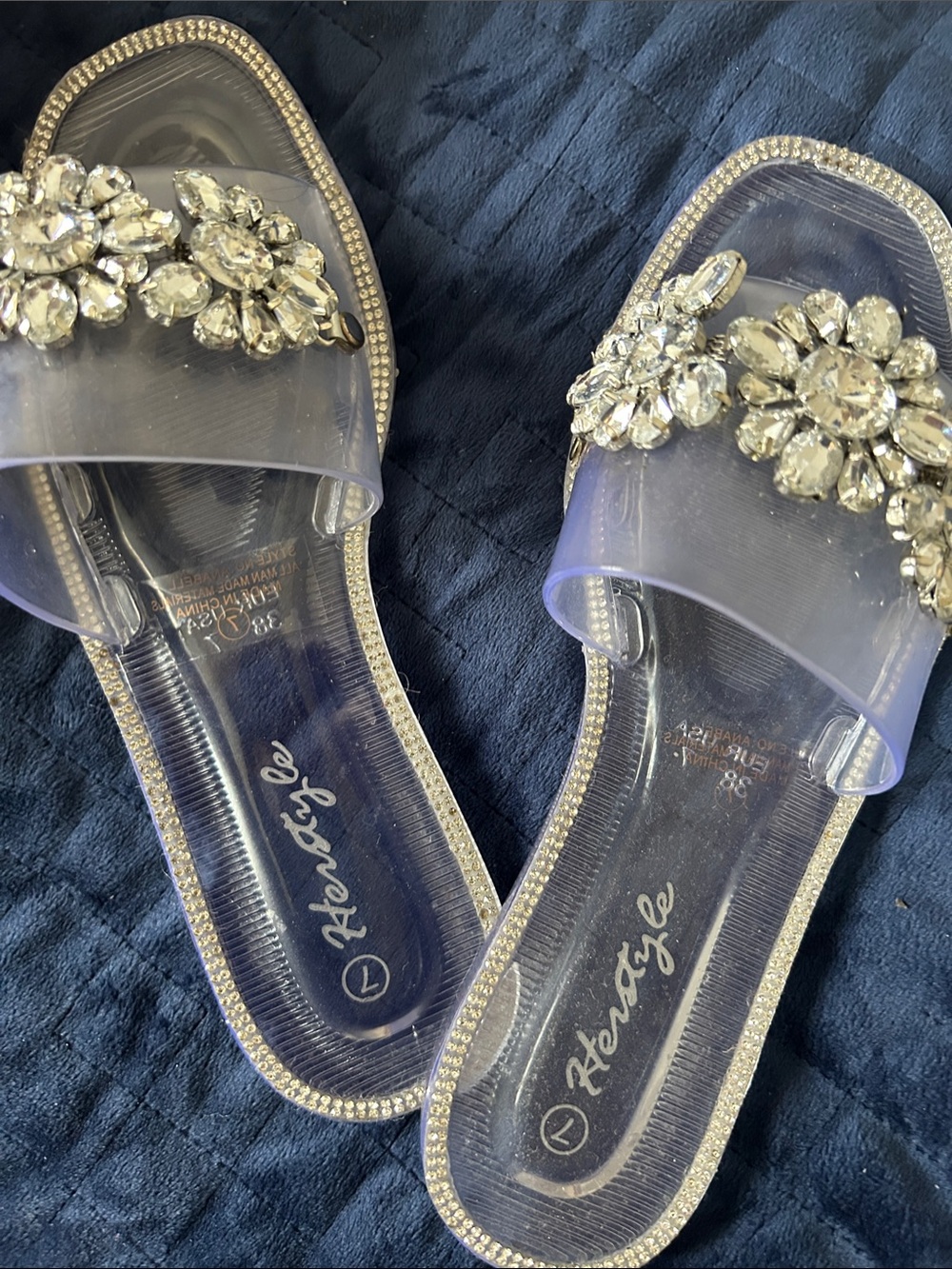 Pretty slide on sandals with glittery silver embellishments. Perfect for summer.